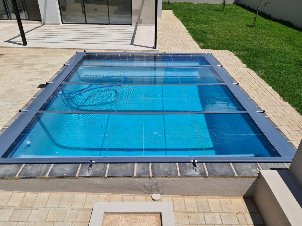 Solid transparent pool cover